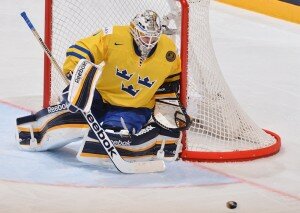 STOCKHOLM, SWEDEN - MAY 19: Sweden's Jhonas Enroth #1 prepares to make a save during gold medal game action at the 2013 IIHF Ice Hockey World Championship. (Photo by Richard Wolowicz/HHOF-IIHF Images)